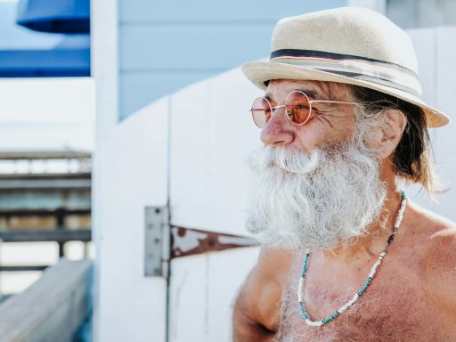 a person with a white beard and hat