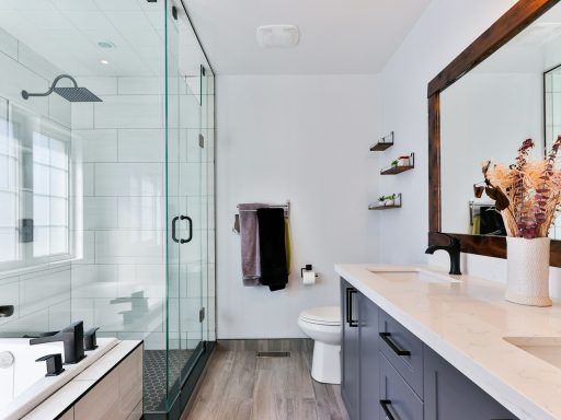 white ceramic sink near white ceramic sink