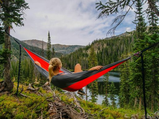 woman on hammock near to river