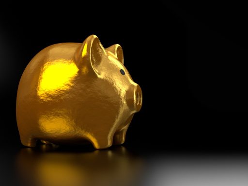 Spaarpot met munten naast een bankpas als symbool voor veilig sparen en depositogarantie